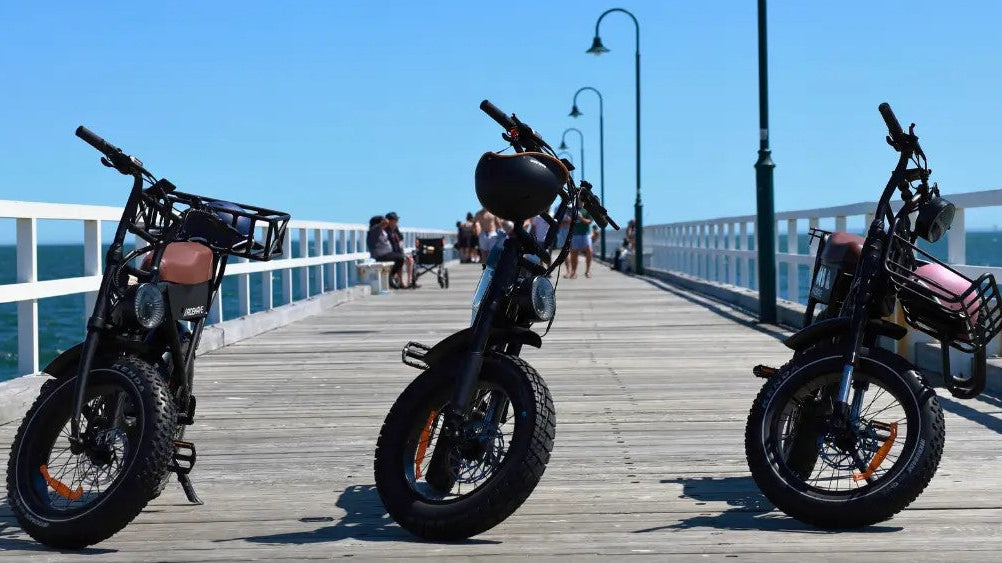 Ridewave Xplorer Series' e-bikes on their kickstand's