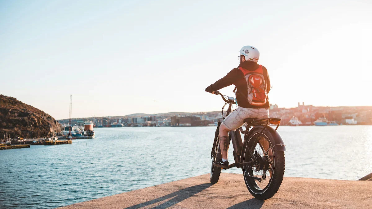 Three fat tyre ebikes on bridge