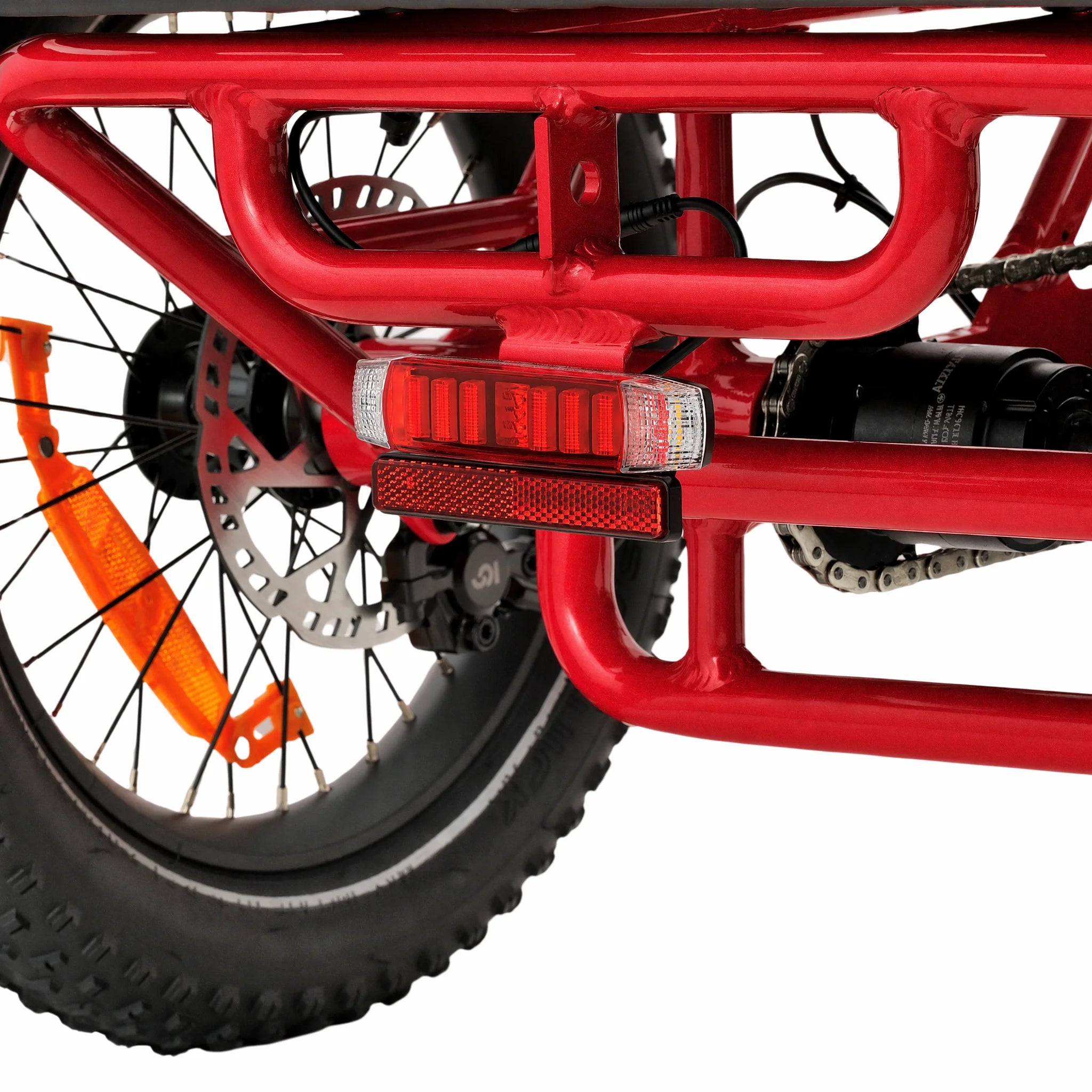 Red tricycle with a black seat and handlebars on a white background #color_red