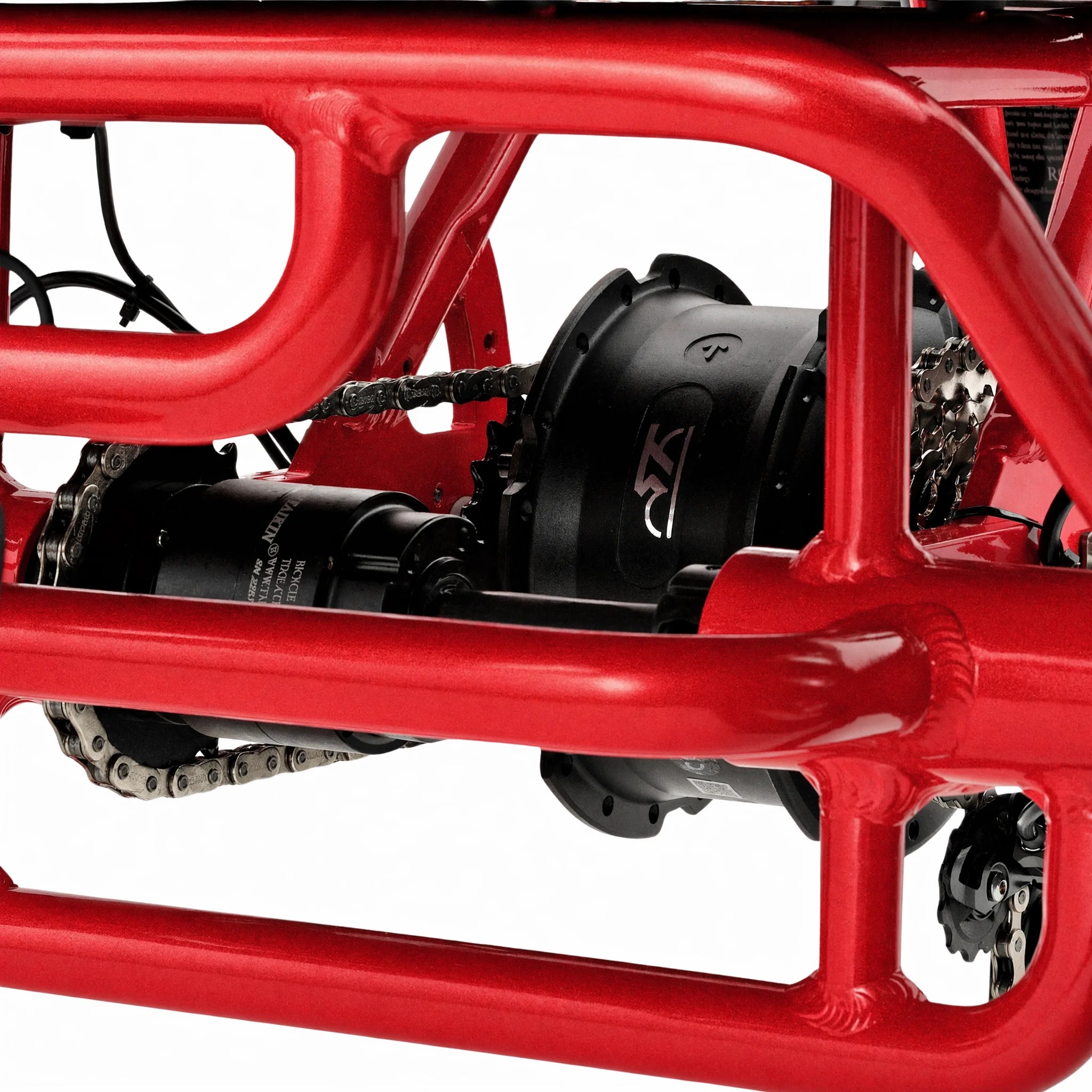 Close-up of a red bicycle with a black gear system on a white background #color_red