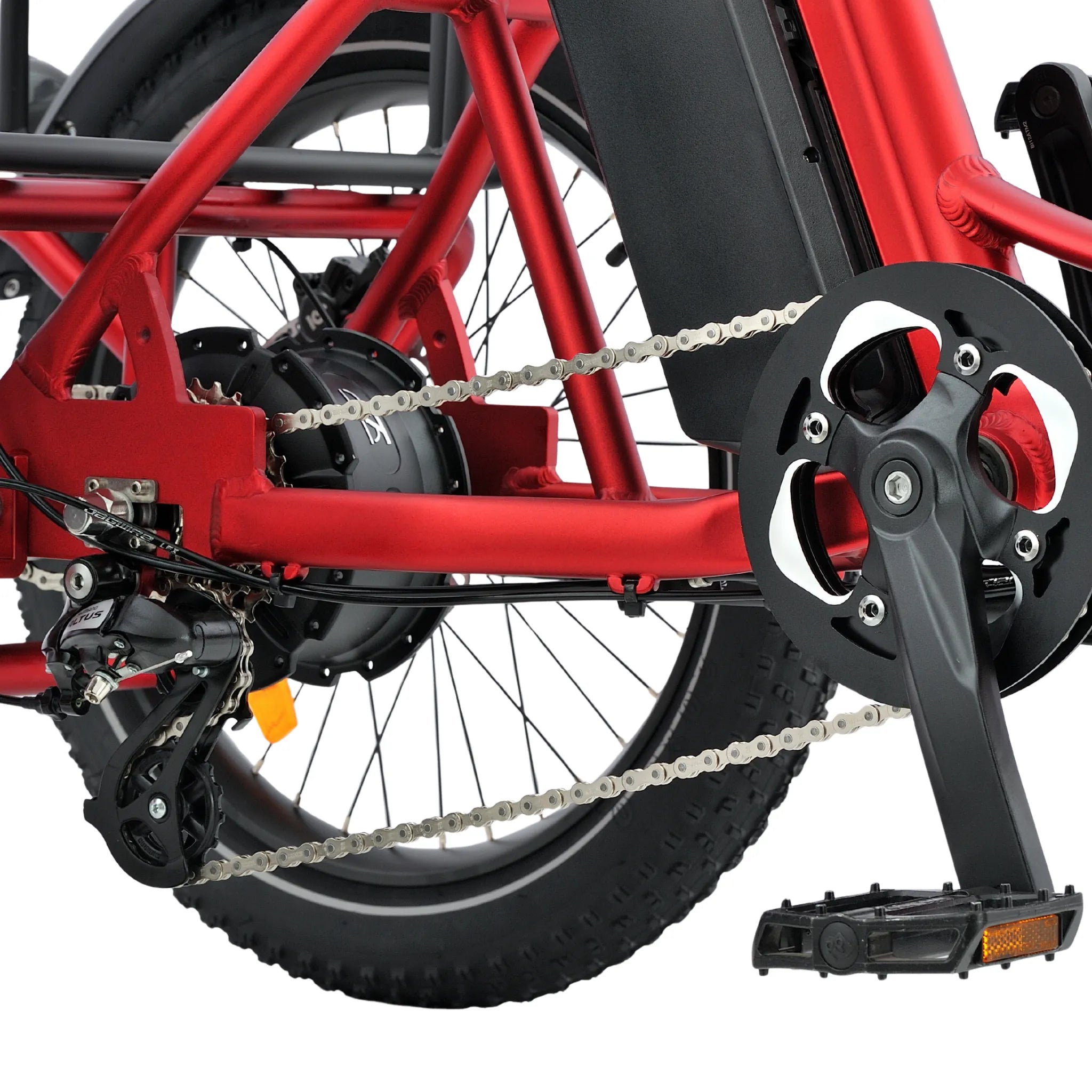 all-groups Close-up of a red electric bike's chain and gear system