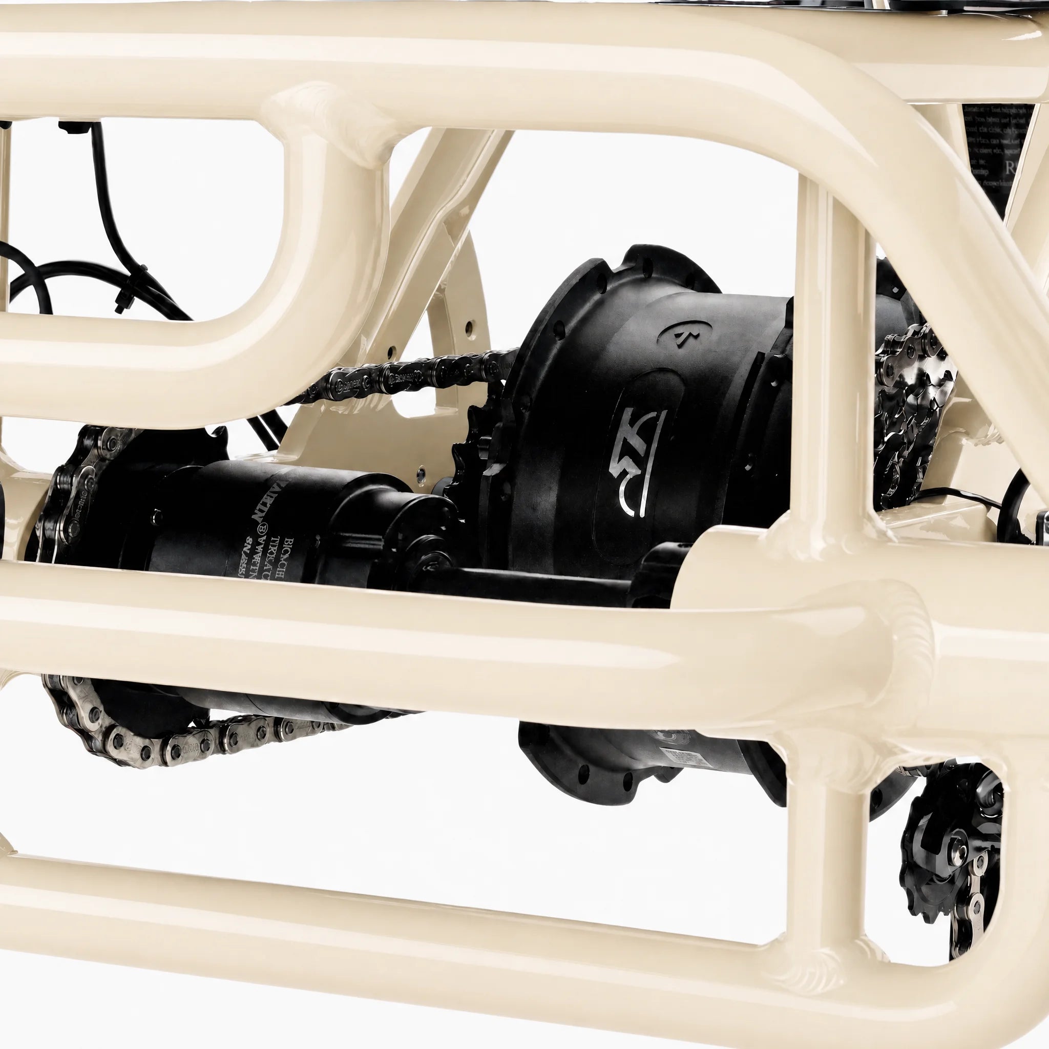 Close-up of a motorcycle frame with visible branding on a white background #color_cream