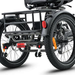 Three-wheeled bike with a cargo rack on a white background