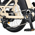 Close-up of an electric bike's chain and gear system on a white background #color_cream