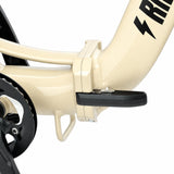 Close-up of a cream-colored bicycle frame with a black pedal. #color_cream