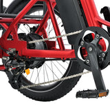 Close-up of a red electric bike's chain and gear system on a white background #color_red