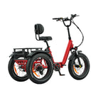 Red tricycle with a seat and cargo rack on a white background